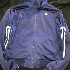 navy blue adidas jacket with stripes down arms